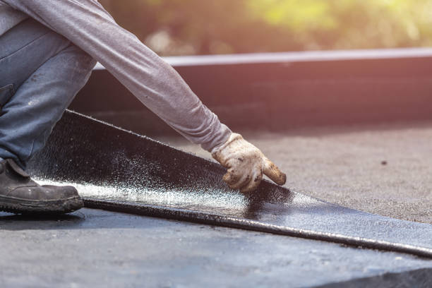 Professional Basement Waterproofing technician working in Linwood, PA